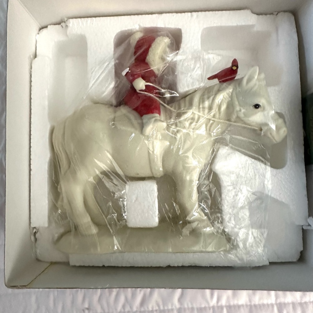 Snowbabies “Along For The Ride” Figurine.